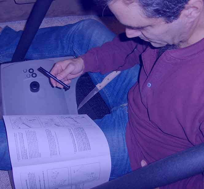 Man-repairing-a-Treadmill